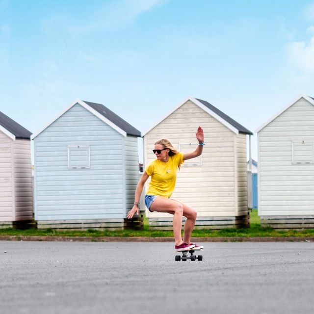 Stella Grace on a skate board